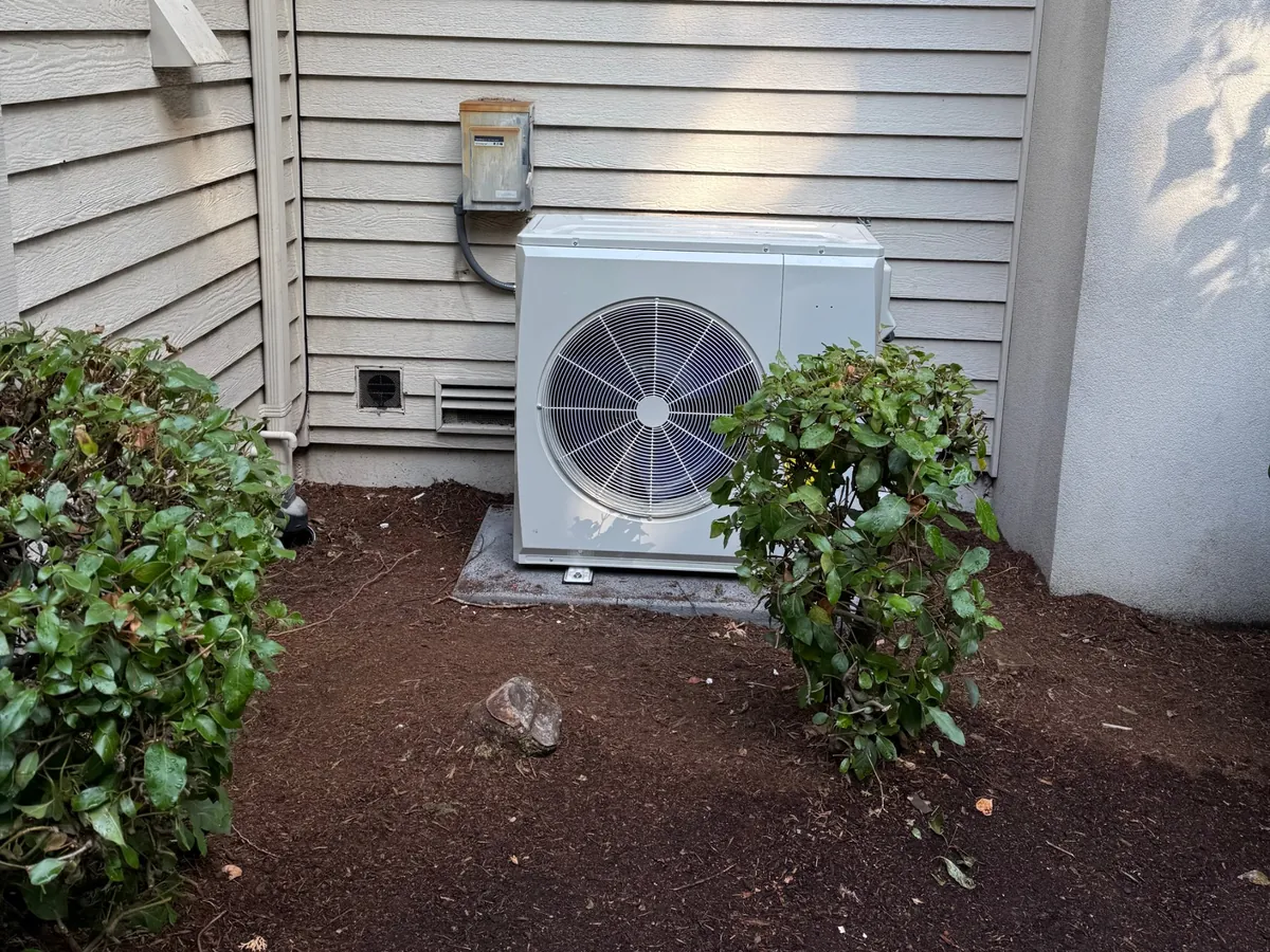 Compact heat pump outdoor unit we installed at an Issaquah home