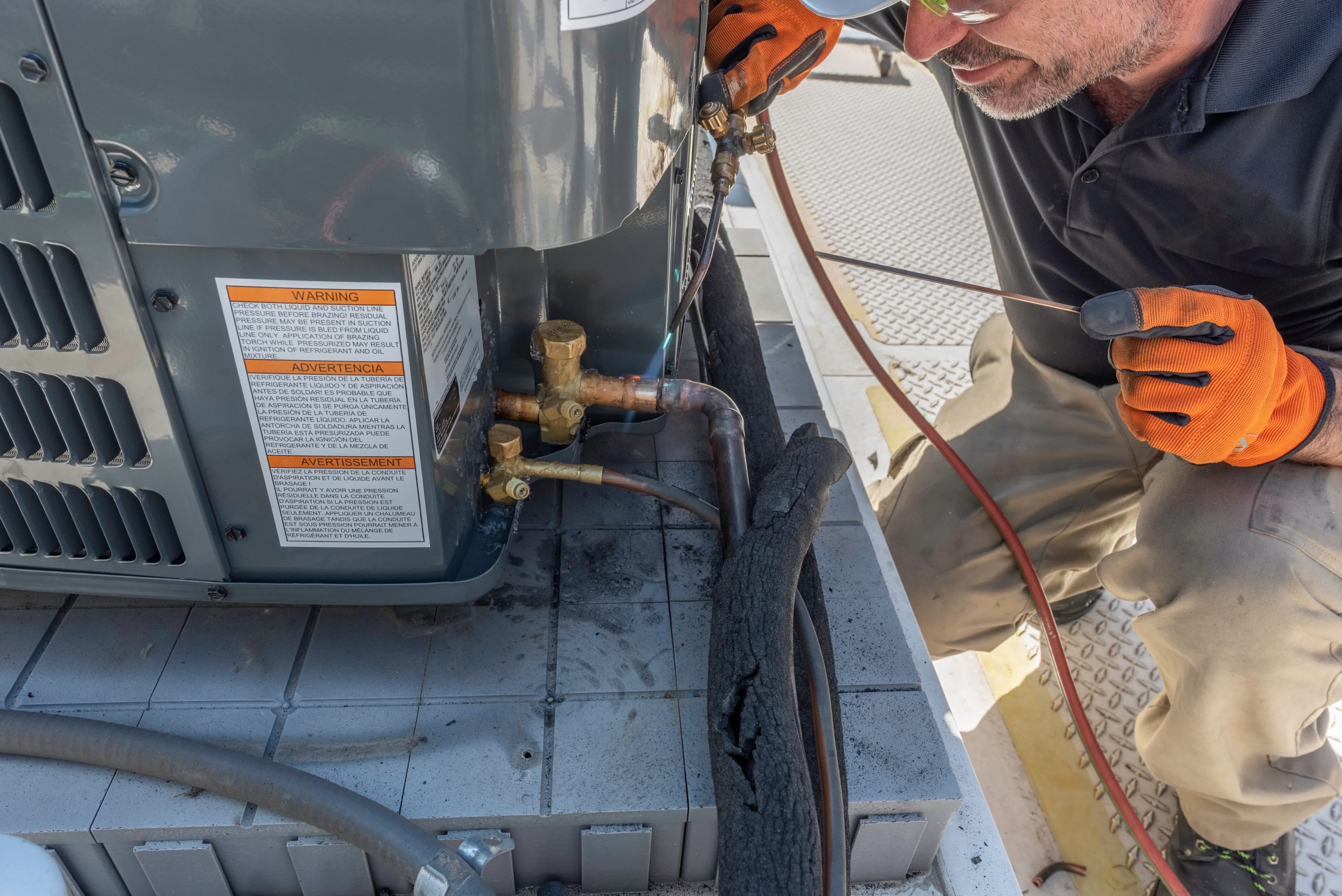Another angle of an expert taking care of a repair job.
