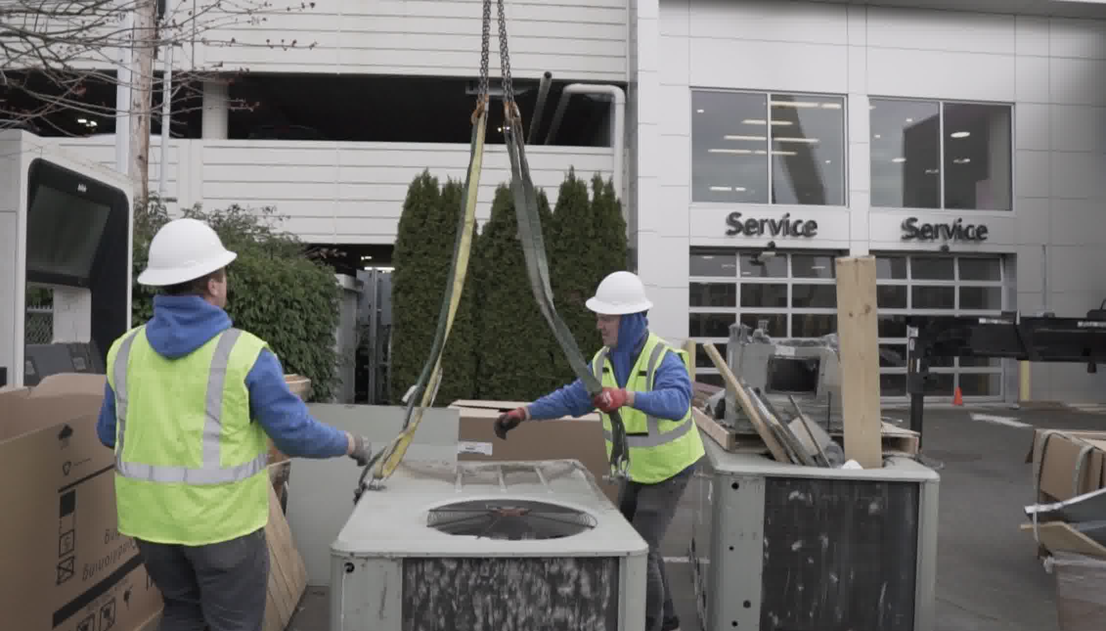 Our professional crew starting on a big commercial AC replacement service.